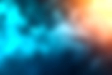 Mavi ve turuncu tonlarda dönen dumanın büyüleyici görüntüsü karanlık bir arkaplan karşısında, ruhani güzelliğiyle gizem ve yaratıcılığı çağrıştırıyor..