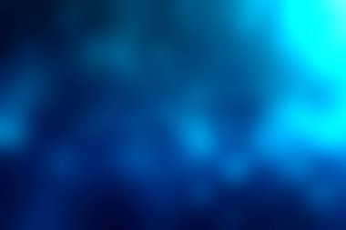 Bu resim göz kamaştırıcı bir mavi bokeh arka plan, parlak daireler, sanatsal projeler veya duvar kâğıdı olarak mükemmel. Yumuşak ışık huzurlu bir atmosfer yaratır..
