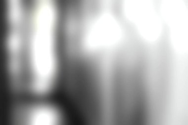 Bu soyut bokeh arkaplan, loş bir mekanda rüya gibi bir atmosfer yaratan yumuşakça bulanık ışıkları barındırır. Sanatsal projeler için ideal.