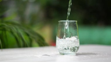 water splash with a glass of white water