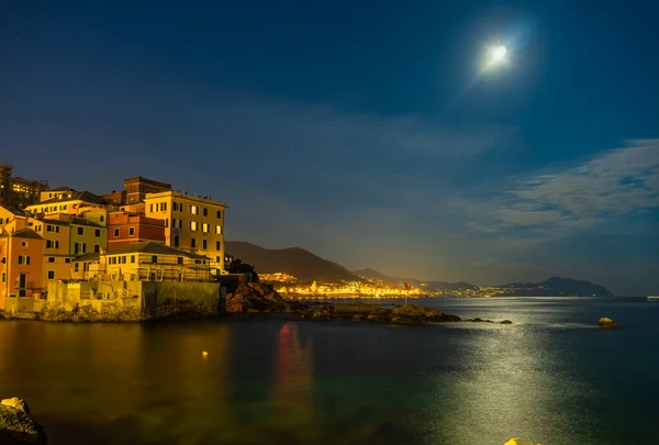 Moonlight view of the ancient fishing village in Genoa, Ligurian sea, Italy.