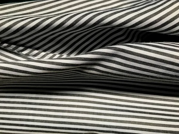 Siyah beyaz çizgili arka plan. soyut kumaş dokusu