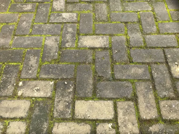 eski tuğla kaldırım arka planı.