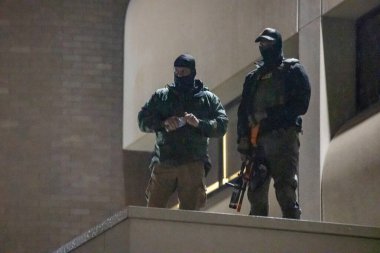 PORTLAND, OR - OCTOBER 10:  The City of Portland protests, some in inflatable costumes in the rain outside the U.S. Immigration detention facility, with unanimous support from the Governor, Mayor, and City Council over the planned federal deployment.