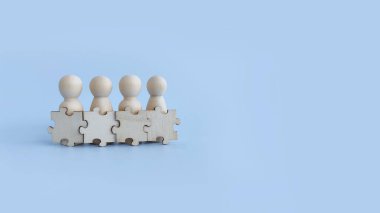 Tahta figürler birleşmeyi, takım çalışmasını ve güçlü işbirliğini sembolize ediyor..