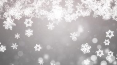 Kışın kar tanelerinin Noel arkaplanı Beyaz Işık eğrisi döngüsünden yavaşça düşüyor.