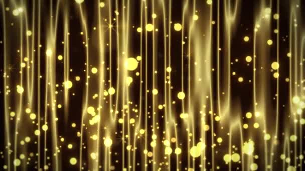 Gráficos de movimiento muestra partículas de oro radiando un fondo oscuro luces muestran. — Vídeo de stock