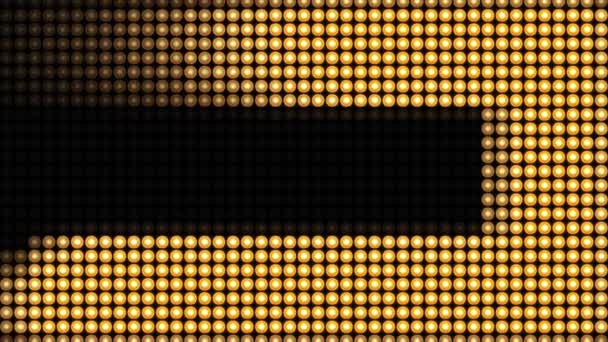 4k Golden blinkende Glühbirnen auf LED-Wand abstrakte Animation Hintergrund. oder Projektoren für Bühnenbeleuchtung. — Stockvideo