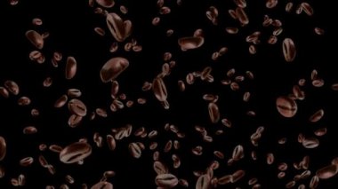 Kavrulmuş kahve çekirdekleri uçar ve yavaş çekimde siyah bir zemin üzerinde döner..