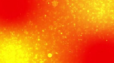 Parlayan yüzen parçacıklar ve parlak dairesel ışık efektiyle pürüzsüz kırmızı-sarı gradyan içeren canlı bir soyut arkaplan..