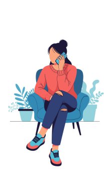 Young woman sitting comfortably in a blue armchair and talking on a mobile phone with plants in the background.