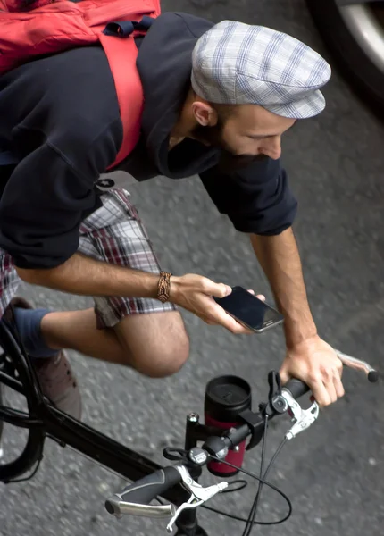 Riding and texting Royalty Free Stock Images