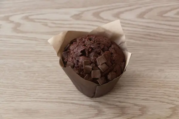 Chokladmuffins Omslagspapper Träpapper — Stockfoto