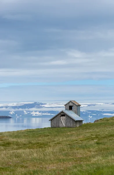 Fjord  with in the distance Vigur island — Stock Photo, Image