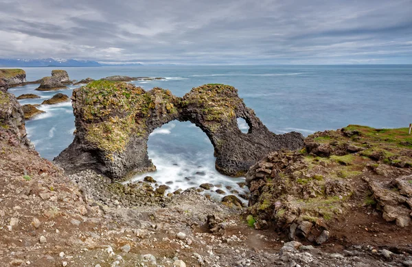 Natural rock gate in Arnarstapi — Stock Photo, Image