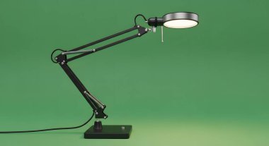 A sleek, modern black articulated desk lamp is positioned against a solid green background, showcasing its adjustable arm and illuminated head.