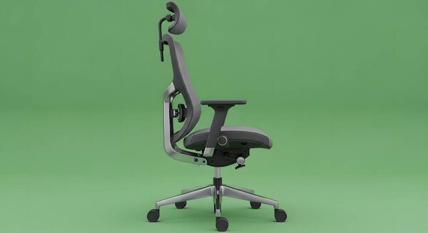 A modern, ergonomic office chair in dark gray with a mesh back, adjustable headrest, and lumbar support, set against a plain green background.
