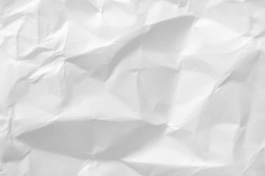 Gri tonda çeşitli buruşuk kağıt yüzeylerinin katıksız, yüksek kontrastlı görüntüsü modern tasarım için çok yönlü minimalist ve dokulu arka planlar sunuyor..