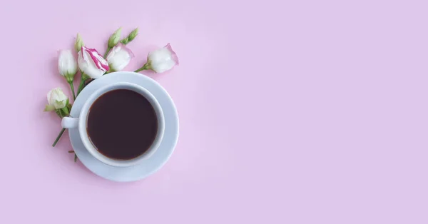 cup of coffee flower rose on a colored background