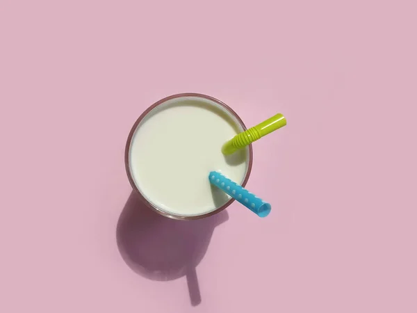 Glass Milk Pipe Colored Background — Stock Photo, Image