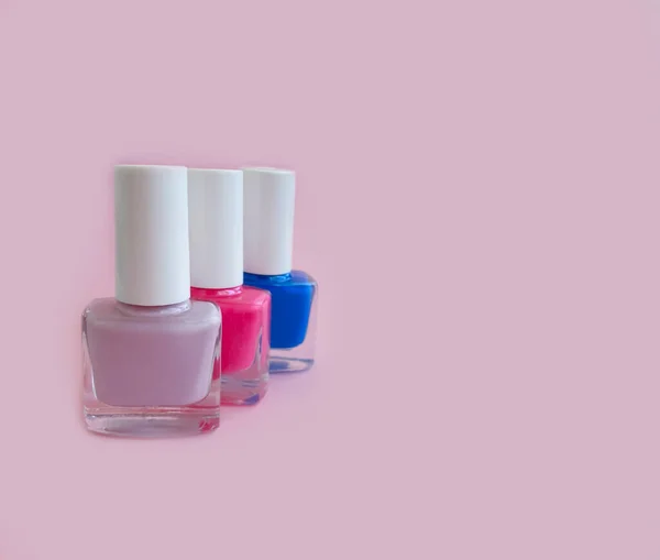 nail polish bottle on a colored background