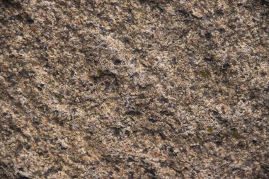 Eski doğal taşın dokusu yakından geliyor.