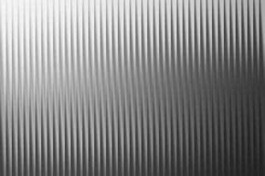 Işık ve gölgenin dinamik etkileşimini yaratan, karmaşık tasarım uygulamaları için mükemmel, tekrarlayan dikey çıkıntılar içeren çarpıcı bir soyut arkaplan.