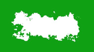 Siyah suluboya mürekkep damlaları desenli kağıda dökülüyor yavaşça yayılıyor. Yeşil cilt arka planında mürekkep damlaları. 4k Görüntü Mürekkep Görüntüsü Geçişi. 4K video canlandırması