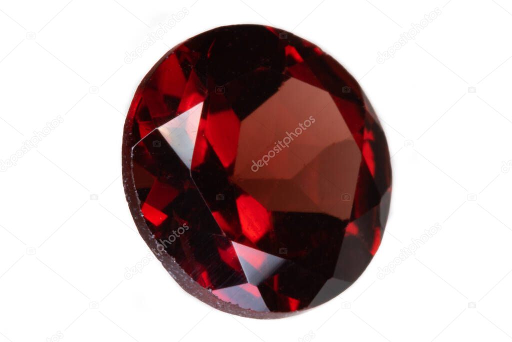 Red Ant Hill Garnet, side view. Round cut, 7.1mm, 1.57 carats. Photographed under natural light (5000K).