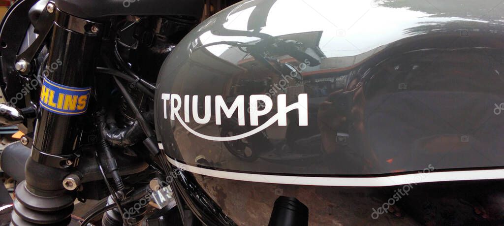 Classic Triumph motorcycle fuel tank
