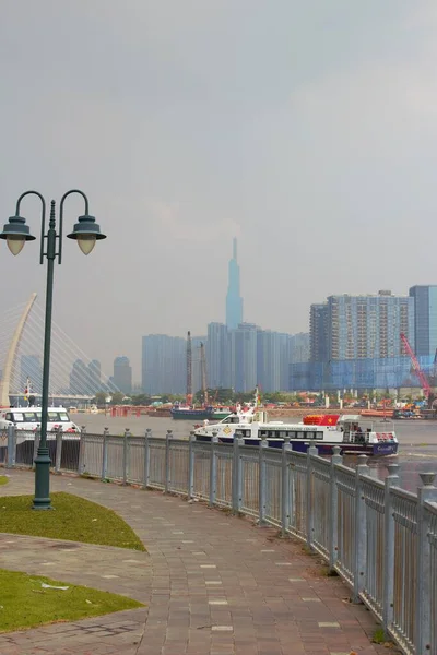 Photo of Bach Dang Wharf  in Ho Chi Minh City, Vietnam on December 5th 2025 : Panorama of Bach Dang Wharf in a misty day. This place is one of the most popuplar landmarks of Saigon that attracts thousands vistitors each year