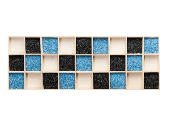 Wooden Box Square Compartments Partly Filled Blue Black Decorative Sand — Stock Photo, Image