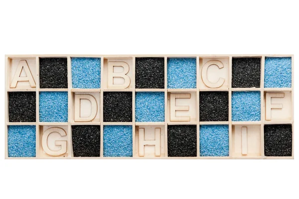 Rectangular Wooden Box Square Compartments Partially Filled Blue Black Decorative — Stock Photo, Image