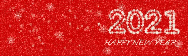 2021 HAPPY NEW YEAR text na červených sněhových vloček bokeh pozadí. — Stock fotografie