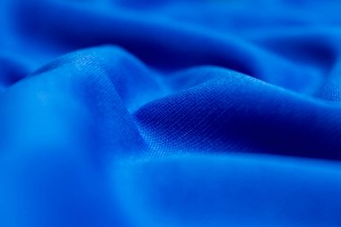 Mavi renk soyut şekil arkaplanı. Duvar kağıdı için ipek kumaş