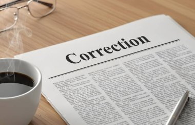 Manşetli bir gazete Düzeltme