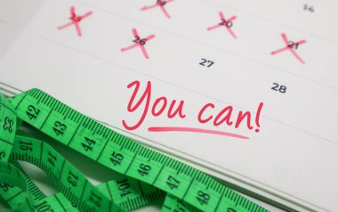 Takvimde ölçüm bandıyla mesaj atabilirsin. Kendini güçlendirme kavramı, fitness hedefleri ve motivasyon.