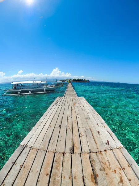 Beautiful sky with curved horizon and clear waters Stock Picture