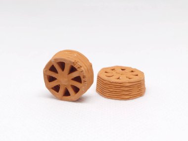 Kahverengi Seramik 3D baskı. Stoneware kil ile halka tekerlek yapısı kullanıyor.