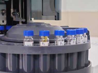 close up Vial glass sampler on autosampler