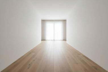 Bu minimalist alan, temiz çizgileri ve ferahlığı olan parlak, havadar bir atmosfere sahiptir.