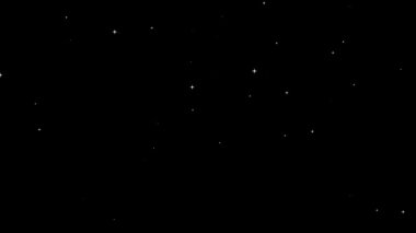 Işıldayan beyaz yıldızlar parıldıyor ve parıldıyor. Derin, karanlık bir gökyüzü arka planında.