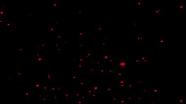 Pürüzsüz döngü hareketi grafiğinde akan parçacıklara sahip animasyon kalp simgesi