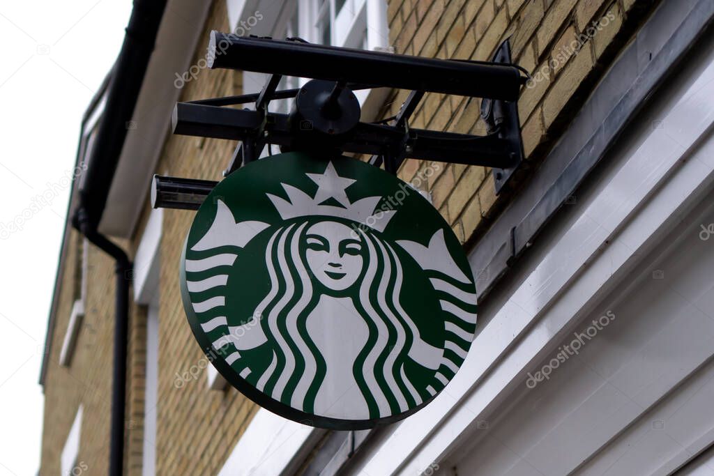 Saffron Walden, Essex, UK - January 12, 2024: Starbucks coffee shop hanging sign