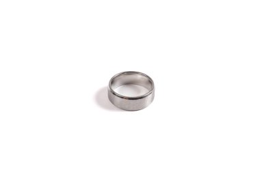 Matte silver ring isolated on white background. Togetherness, wedding, love concept. Men's wedding platinum ring band