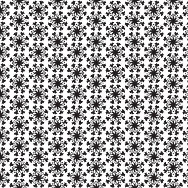 Yoğun, tekrarlayan küçük, yıldız benzeri veya kar tanesine benzeyen siyah renkli geometrik şekiller beyaz bir arkaplanda karmaşık bir tessellasyon oluşturur..