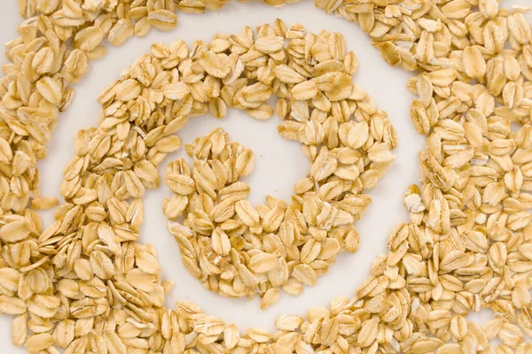 Beyaz arkaplanlı bir sürü yulaf ezmesi çizilmiş.