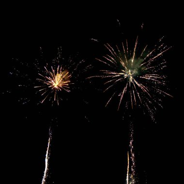 Colored fireworks in french summer sky