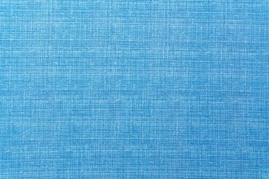 Açık mavi dokuma kumaş, doğal dokuma lifleri ve düz dokuma yapısını gösteren detaylı bir görünüm. Gökyüzü mavisi modern tasarım projeleri, yeni temalar ve sakinleştirici yaratıcı uygulamalar için mükemmel bir renk.