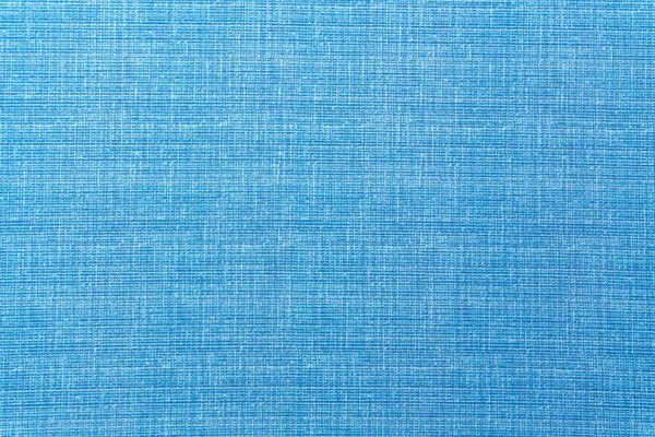 Açık mavi dokuma kumaş, doğal dokuma lifleri ve düz dokuma yapısını gösteren detaylı bir görünüm. Gökyüzü mavisi modern tasarım projeleri, yeni temalar ve sakinleştirici yaratıcı uygulamalar için mükemmel bir renk.